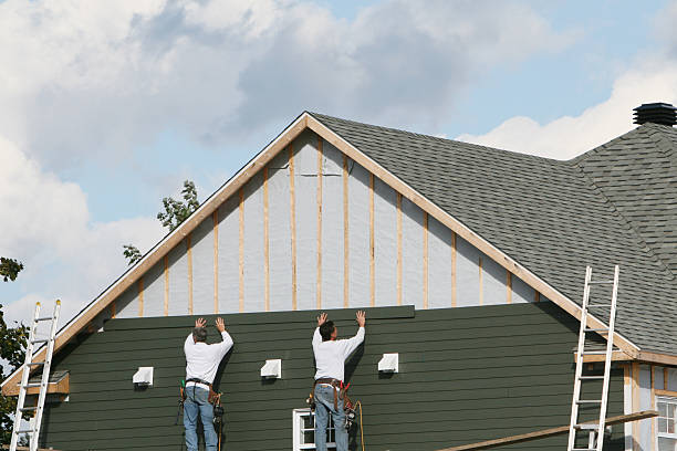 Professional Siding Installation technician working in Alva, FL